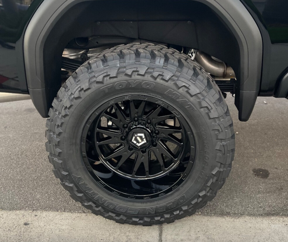 2024 GMC Sierra 2500 Denali with Toyo Open Country M/T tires and TIS 547B wheels