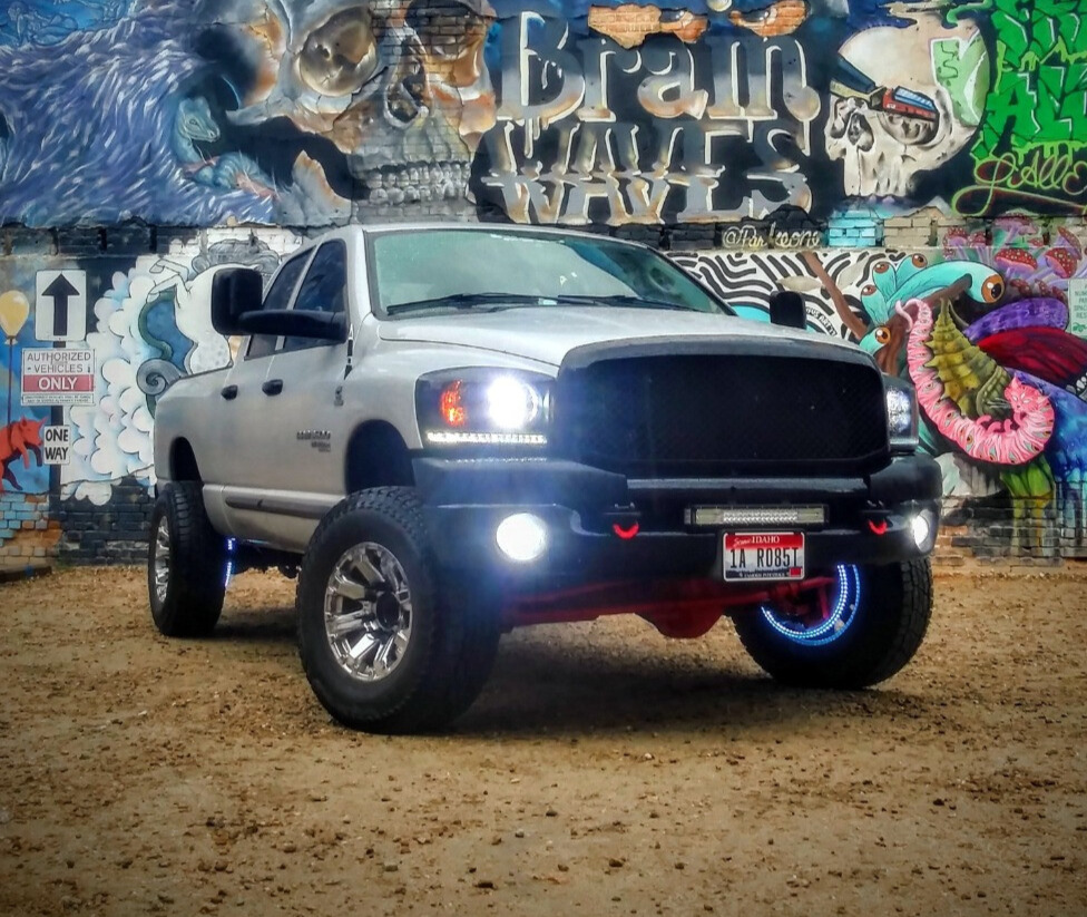 2006 Dodge Ram 3500 with Raceline Throttle wheels and Open Range All Terrain wheels