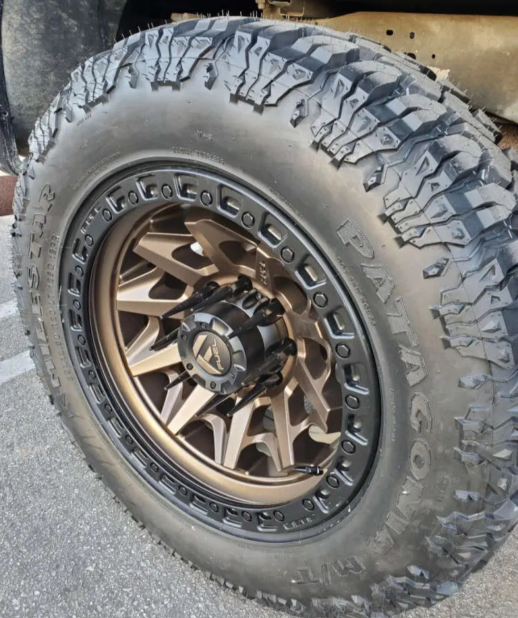 2003 Ford F-350 Super Duty with Fuel Covert wheels and Spiked Lug Nut Replacements