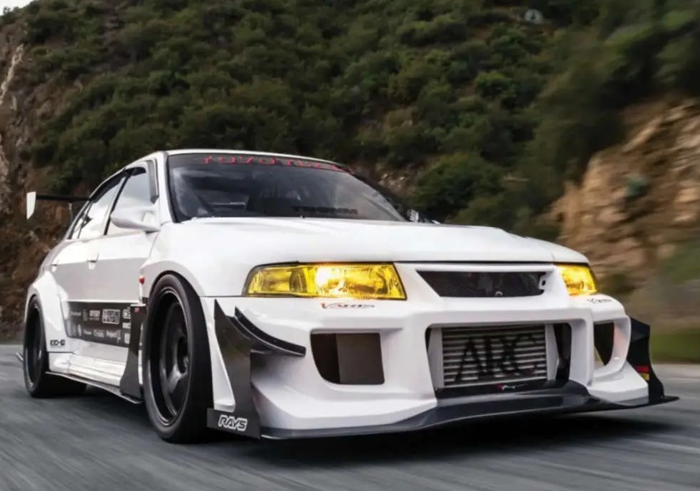 1998 Mitsubishi Lancer Evolution with Volk CE28 Club racer ii black edition wheels