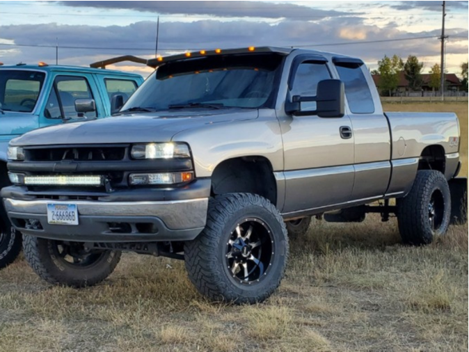 1999 Chevy Silverado 1500 with Cooper Discoverer STT Pro tires and Rough Country Suspension Lift