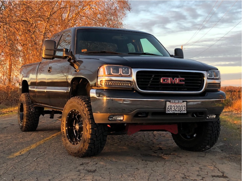 2001 GMC Sierra 1500 with SuperLift Suspension Lift and Moto Metal MO962 wheels
