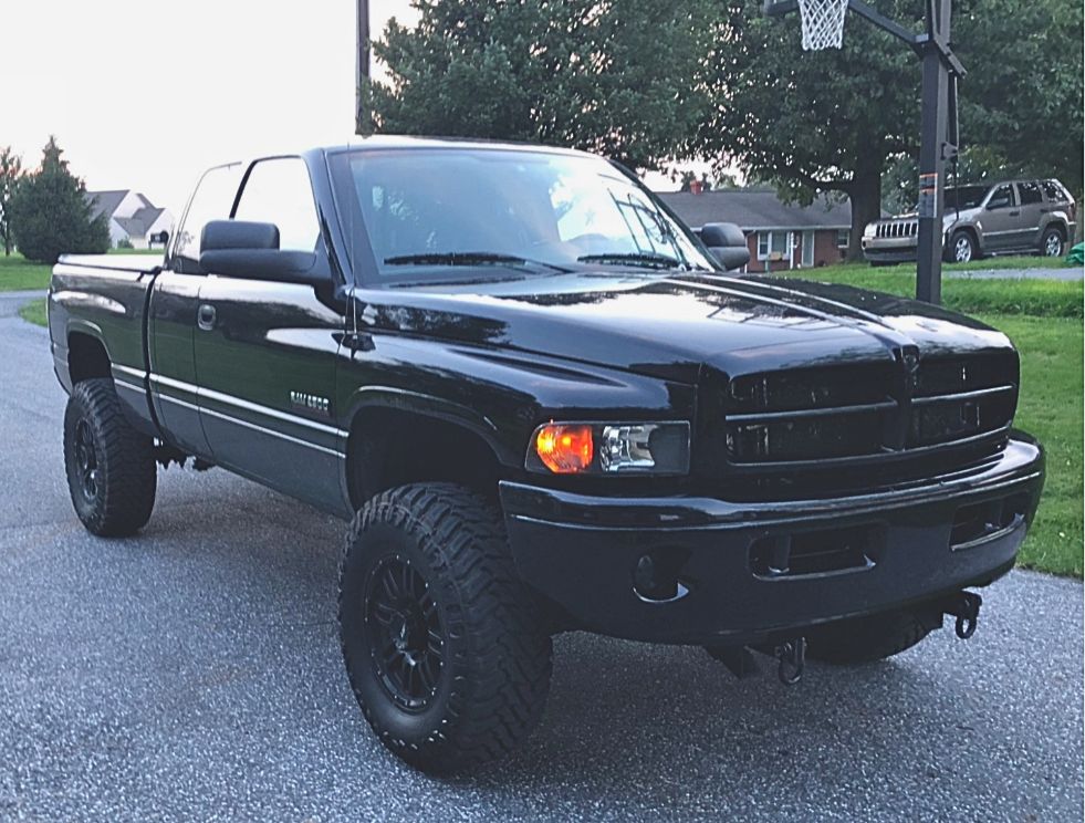 2002 Dodge Ram 2500 with American-Racing AR901 wheels and Atturo Trail Blade MT tires