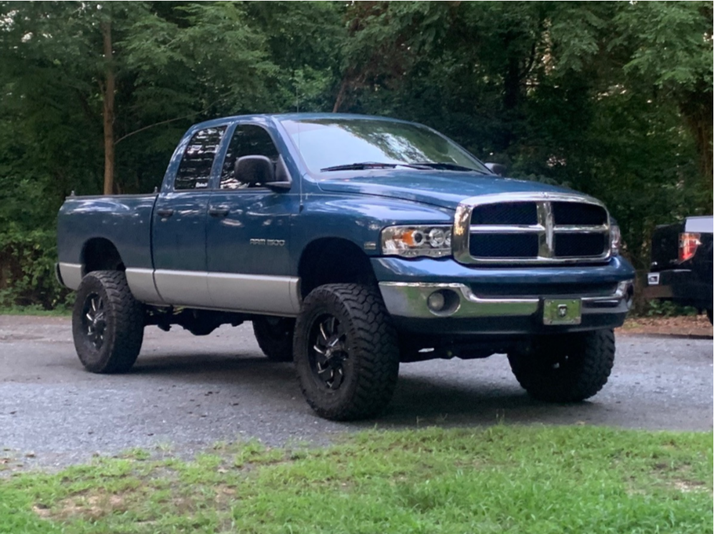 2003 Dodge Ram 1500 with Nitto Ridge Grappler tires and Fuel Cleaver wheels