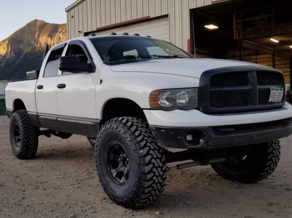 2003 Dodge Ram 2500 with Dick Cepek Blackout wheels and Toyo Open Country M/T tires