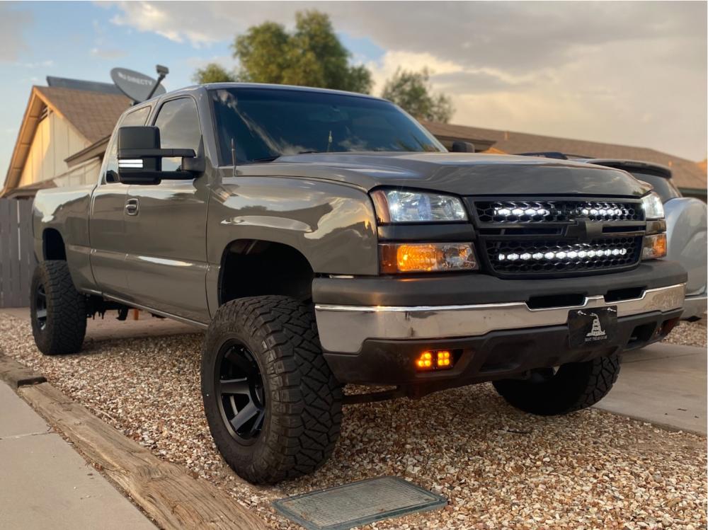 2004 Chevy Silverado 1500 with Black Rhino Raze wheels with Nitto Ridge Grappler tires