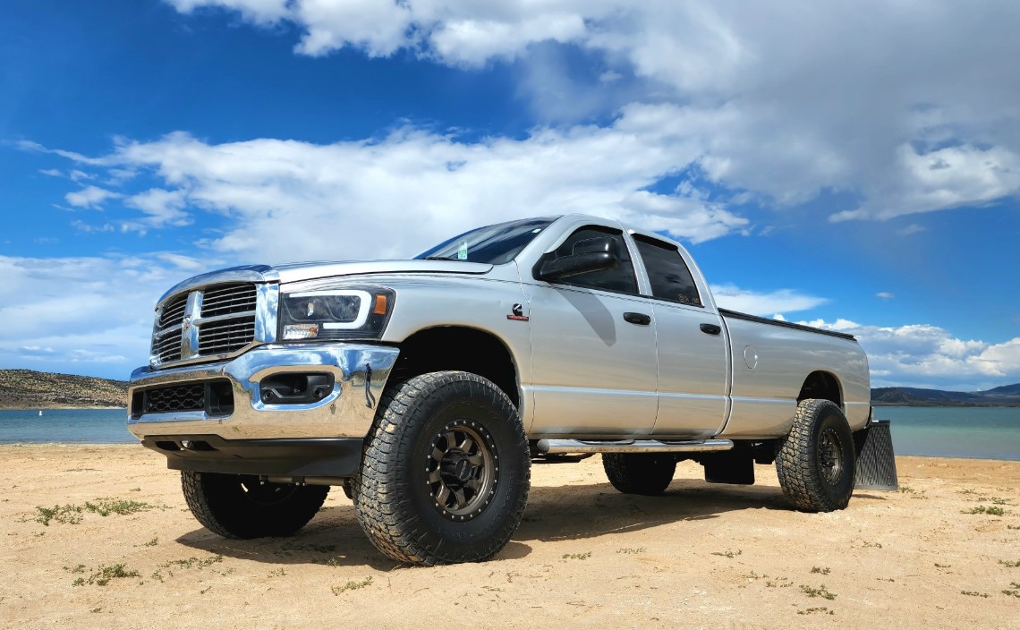 2006 Dodge Ram 2500 with Raceline Avenger wheels and Nitto Terra Grappler G2 tires