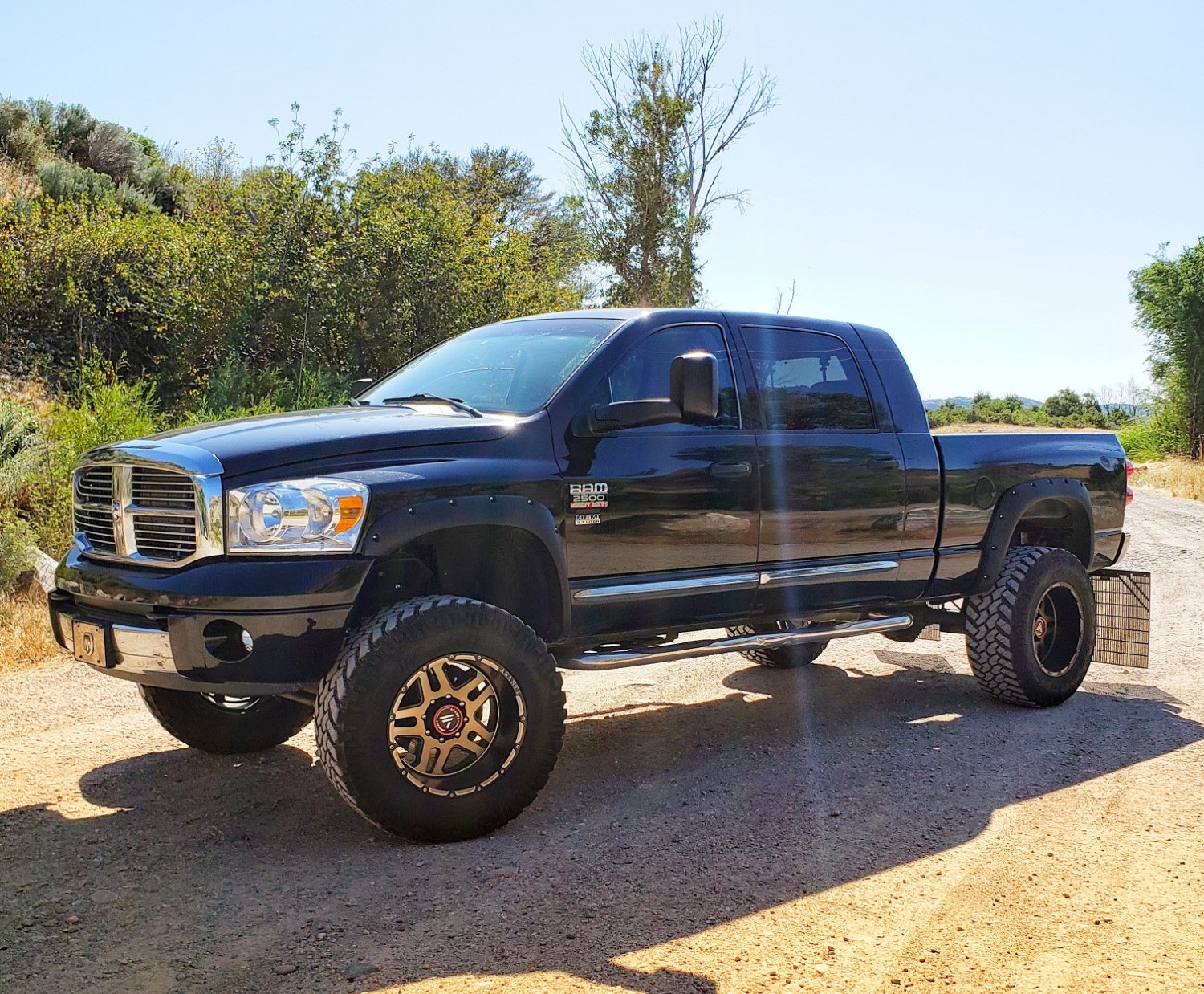 2007 Dodge Ram 2500 with Asanti OffRoad AB809 wheels and Nitto Trail Grappler tires