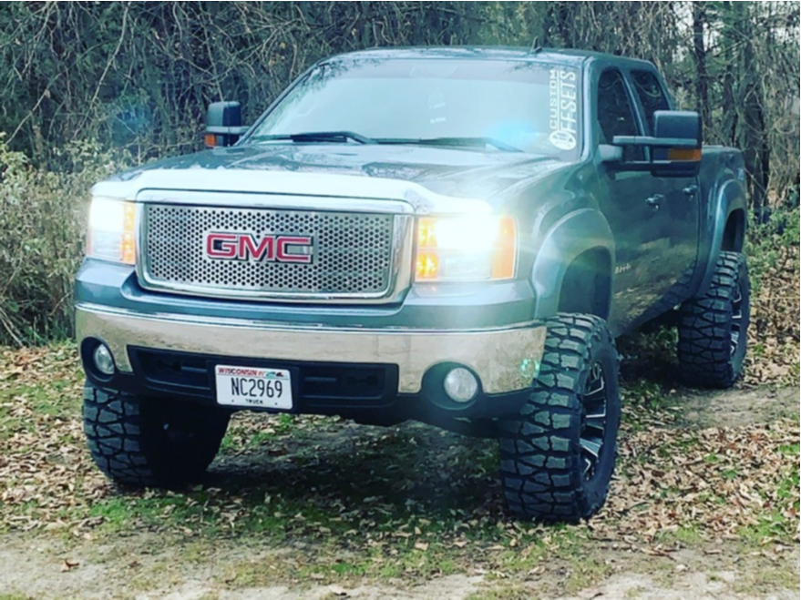 2007 GMC Sierra 1500 with Fuel Assault wheels and Nitto Mud Grappler tires