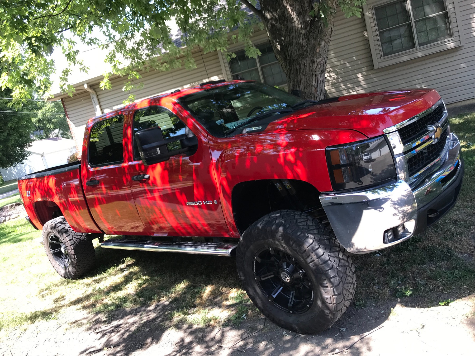2008 Chevy Silverado 2500 HD with Anthem Off-Road Defender wheels and Rough Country Suspension Lift