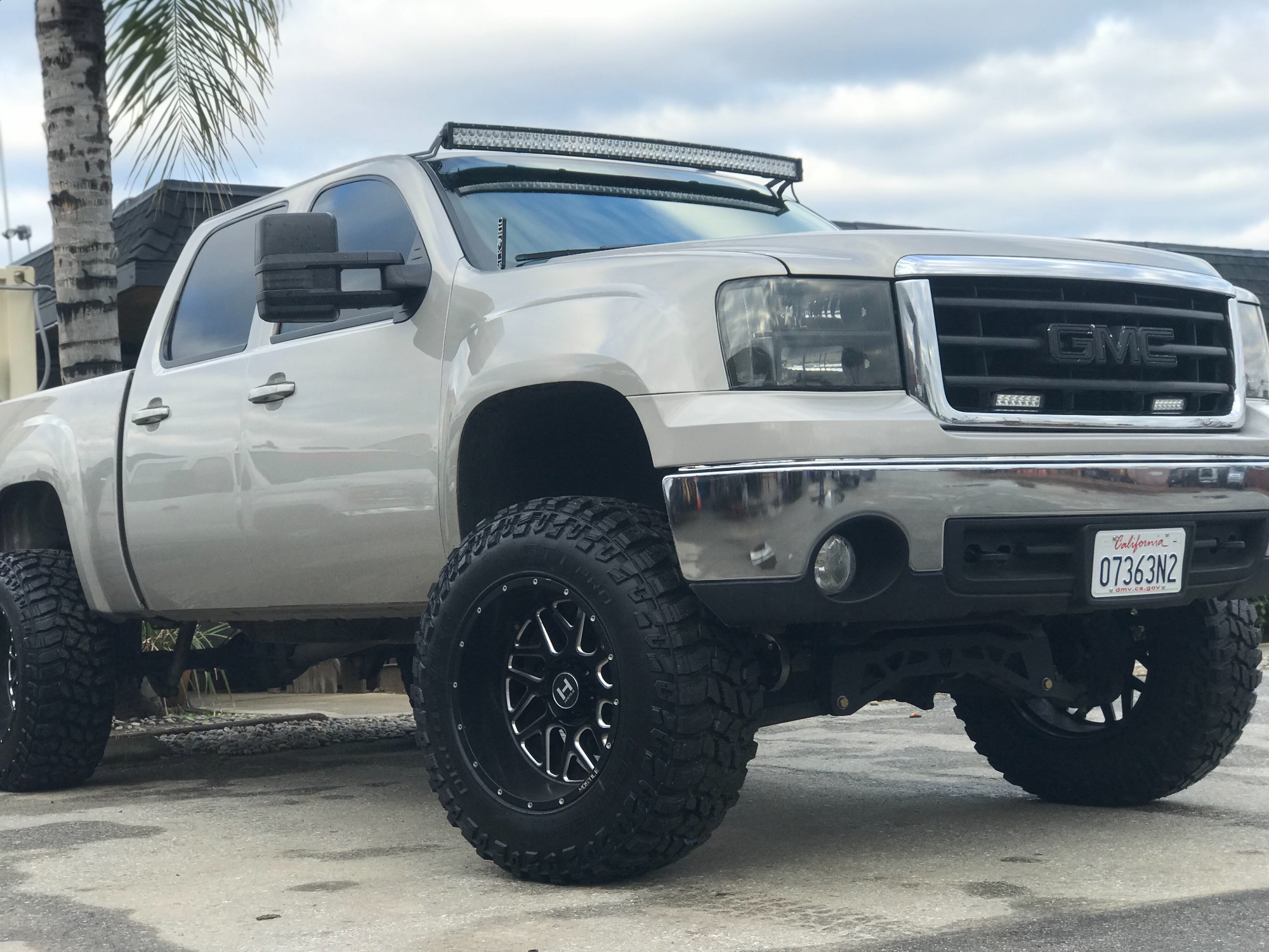 2010 GMC Sierra 1500 with Hostile Sprocket wheels and Cooper Discoverer STT Pro tires