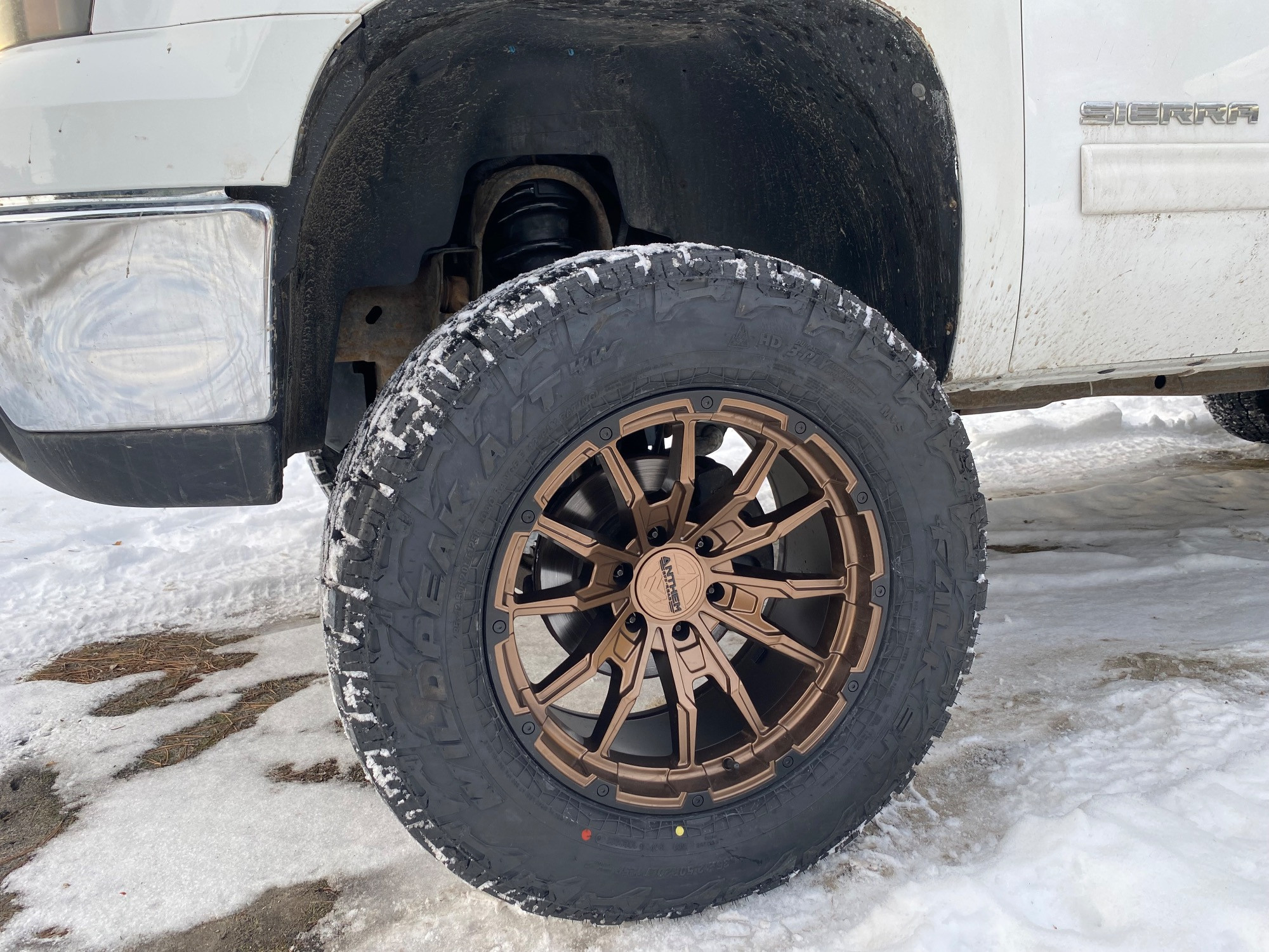 2011 GMC Sierra 1500 with Falken Wildpeak AT4W tires and Anthem Off-Road Talon wheels