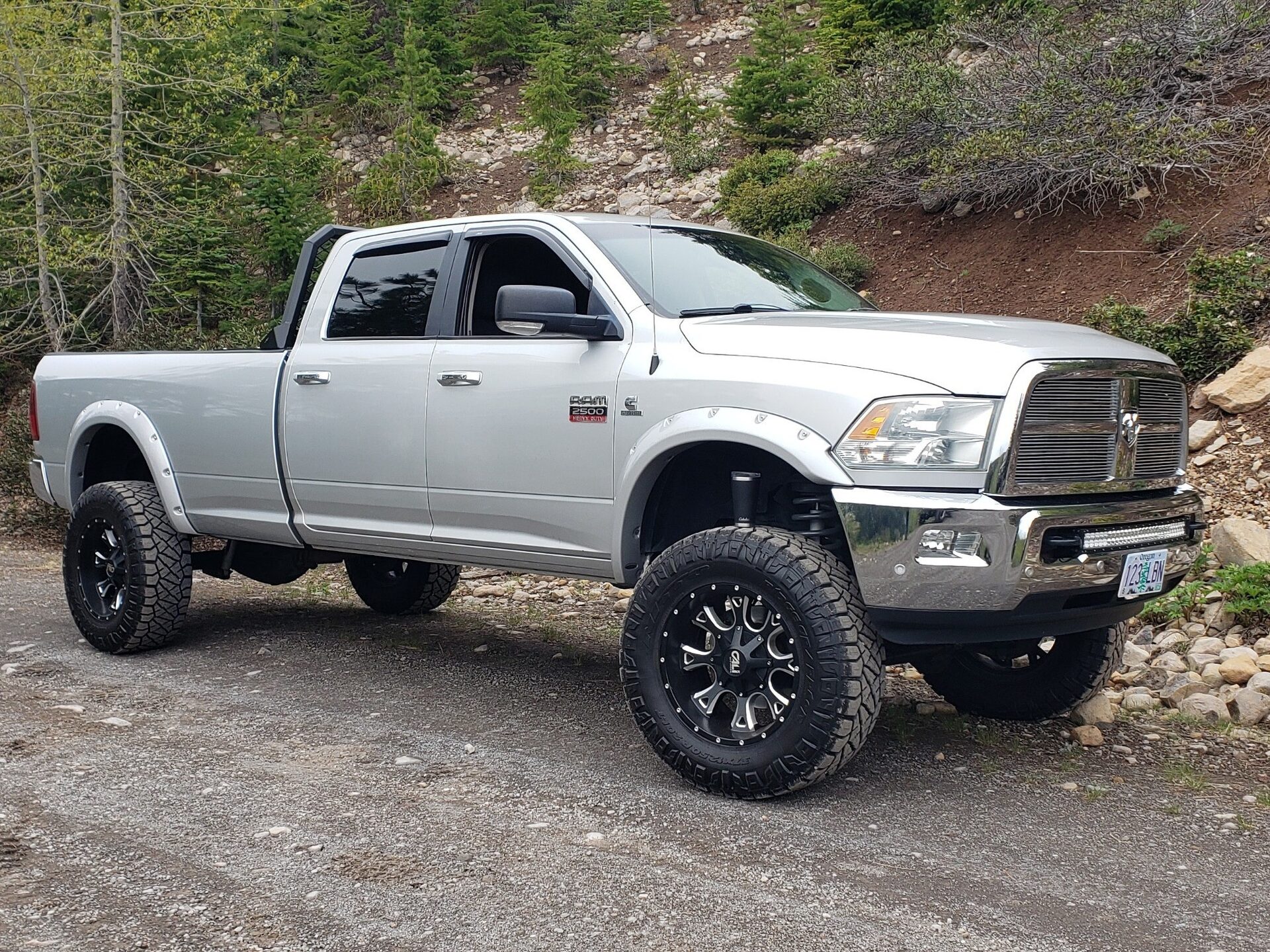 2011 Ram 2500 Cali Offroad Anarchy wheels and Nitto Ridge Grappler tires