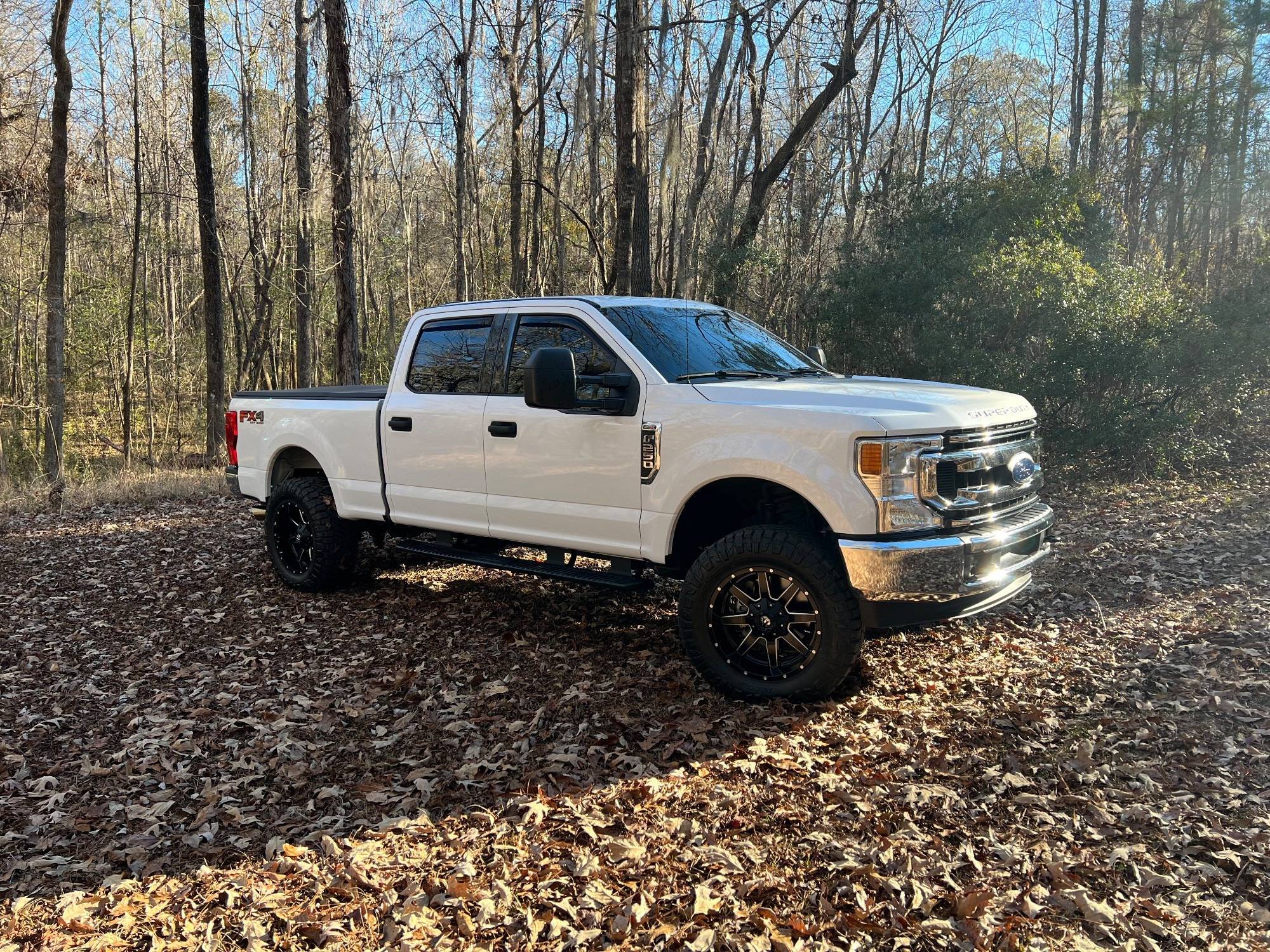 2019 Ford F-250 with a 3-inch lift on 20x10 Fuel Maverick wheels and 35x12.5R20 Nitto Ridge Grappler tires