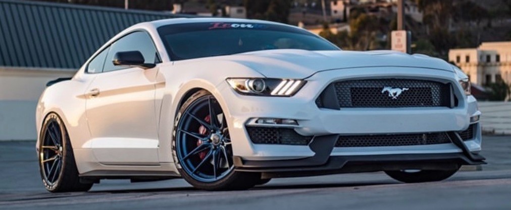 front view of white ford mustang
