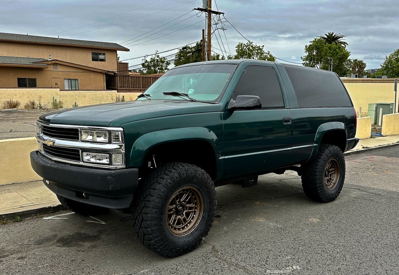 1995 GMC Yukon with Fuel Nitro wheels and Goodyear Wrangler Duratrac tires