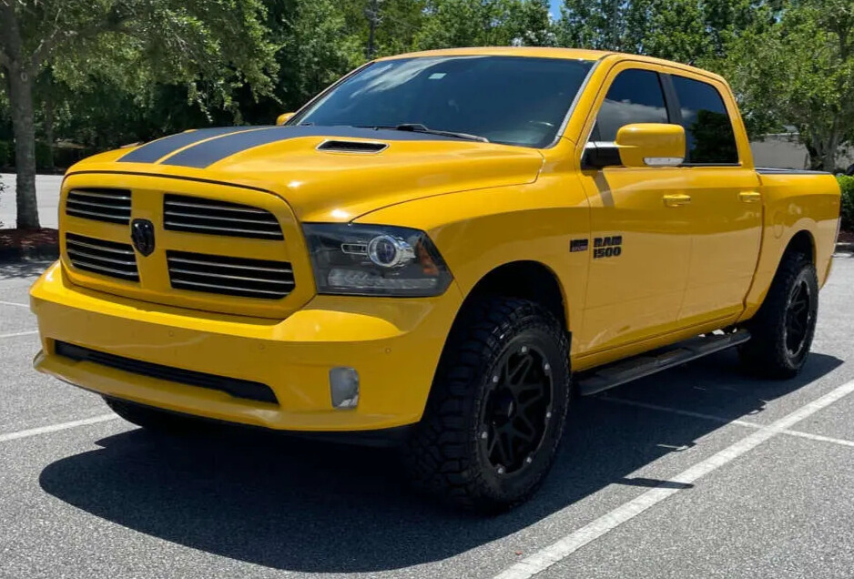 2016 Ram 1500 with Vision Se7en wheels and Rough Country Leveling Kit