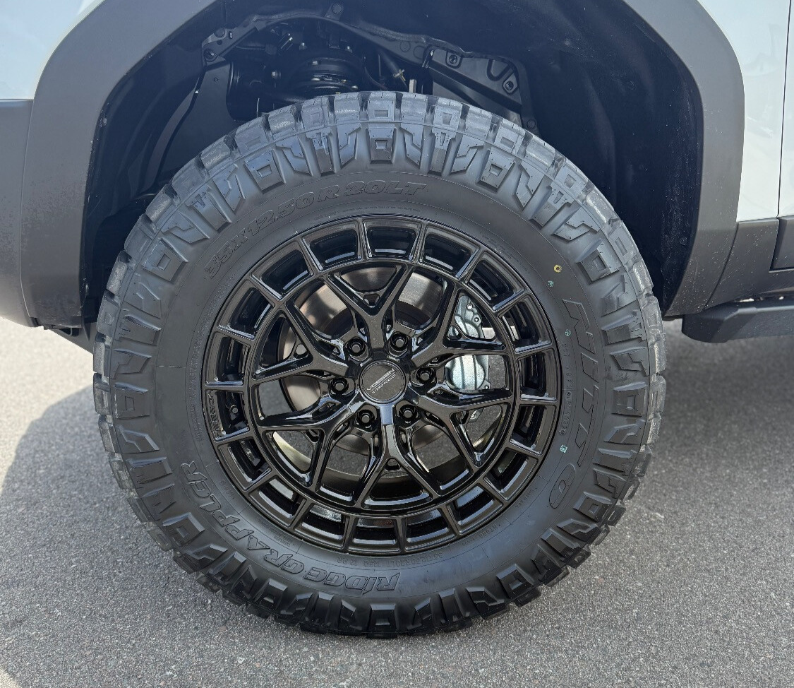 2025 Toyota Land Cruiser with Nitto Ridge Grappler tires and Rough Country Suspension Lift