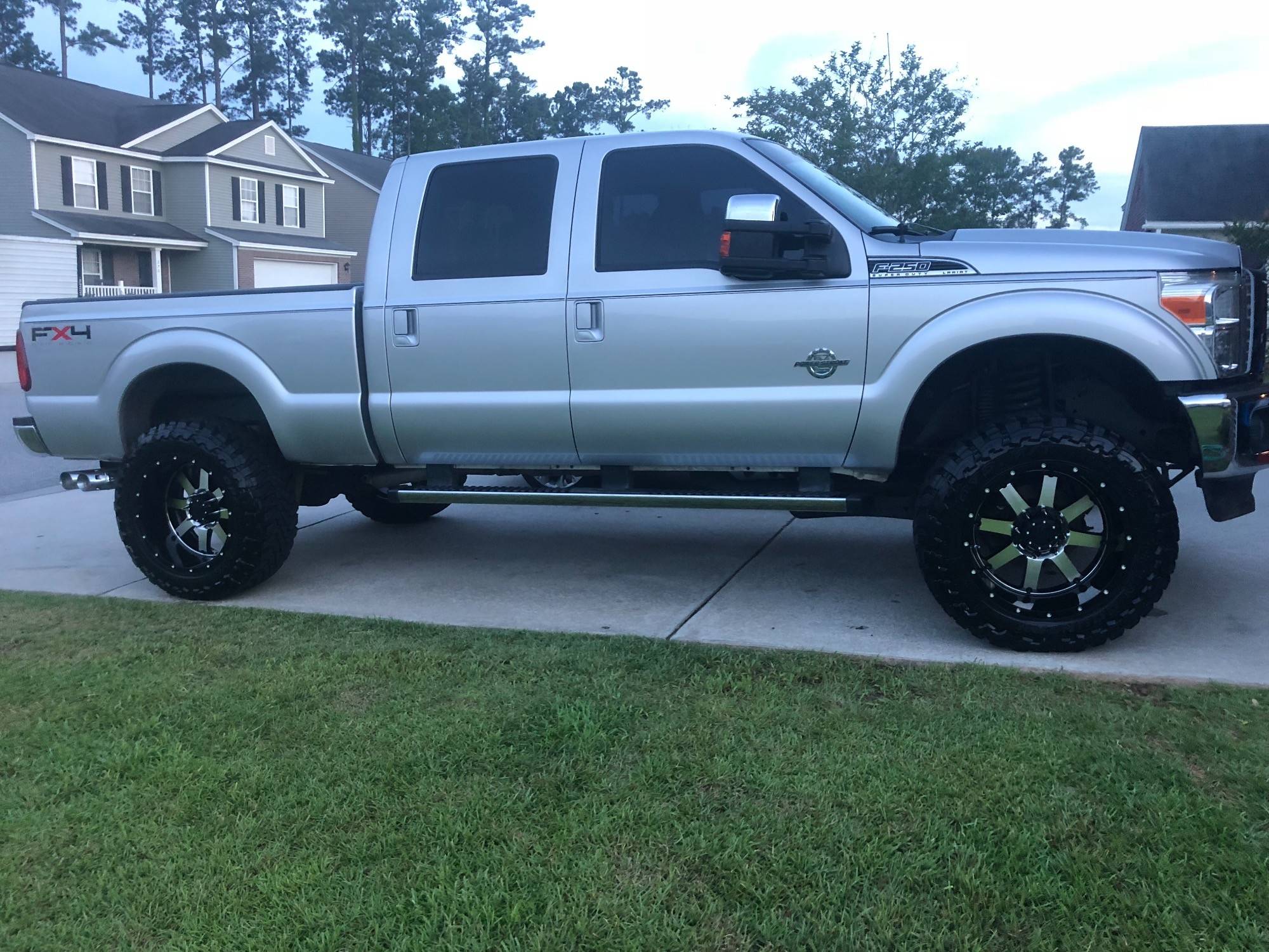 2011 Ford F-250 with a lift kit on 22x12 Gear Off-Road Big Block wheels and 37x13.5R22 Toyo Open Country R/T tires