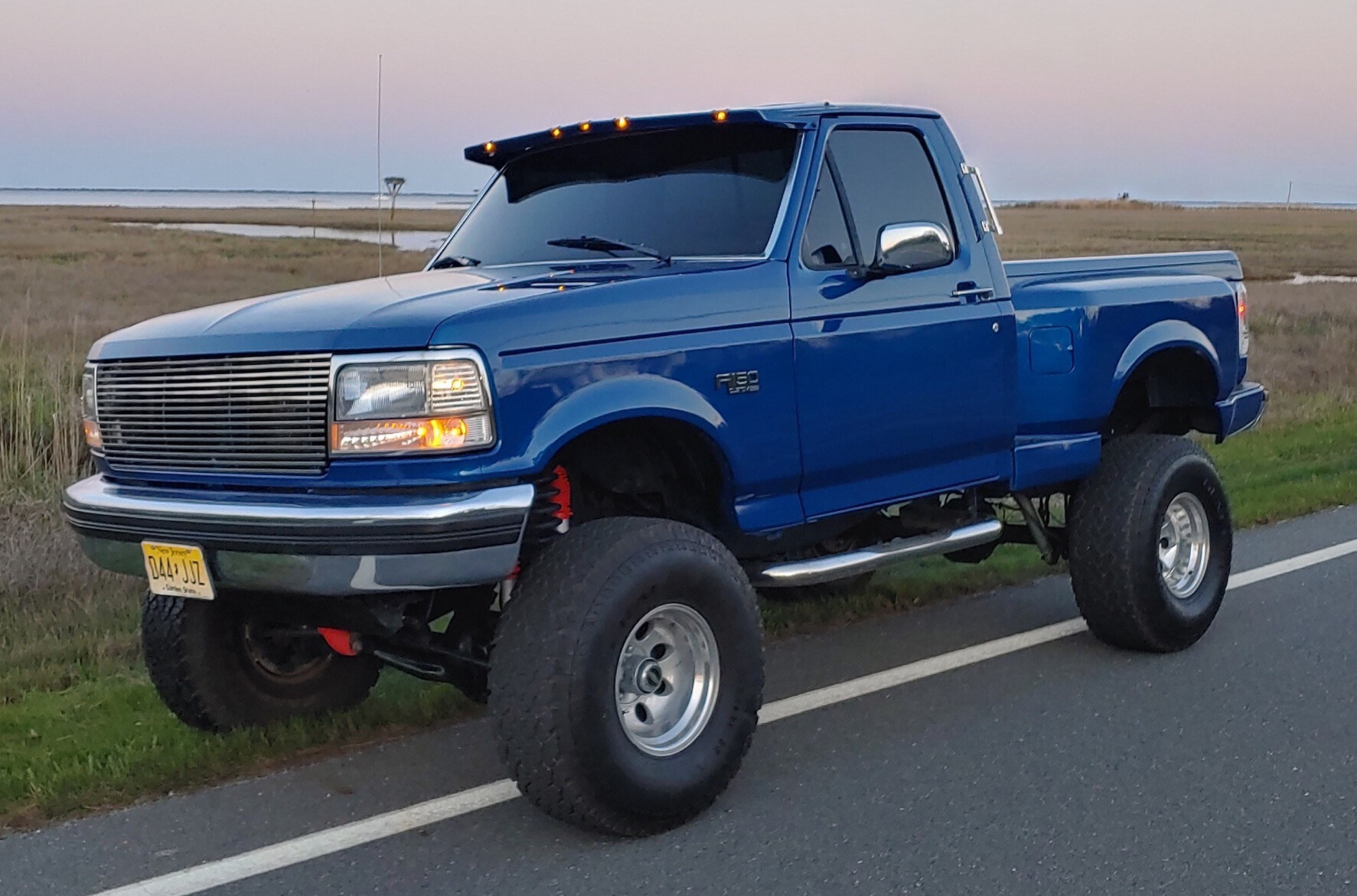 1994 Ford F-150 with BFGoodrich Mud Terrain T/A KM3 tires and SuperLift Suspension Lift
