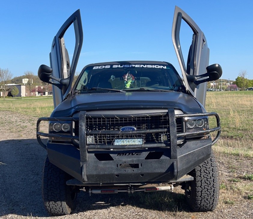 front view of ford excursion with butterfly doors