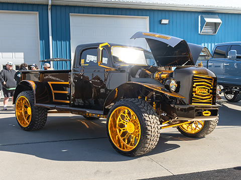 Black and gold Dodge pickup truck parked at FP 5.0 in Jamestown, TN