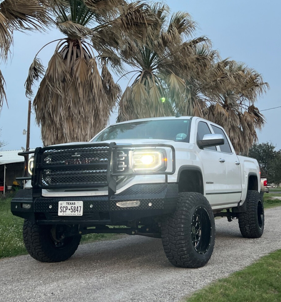 2018 GMC Sierra 1500 SLT with Anthem Off-Road Avenger wheels and Radar Renegade RT tires
