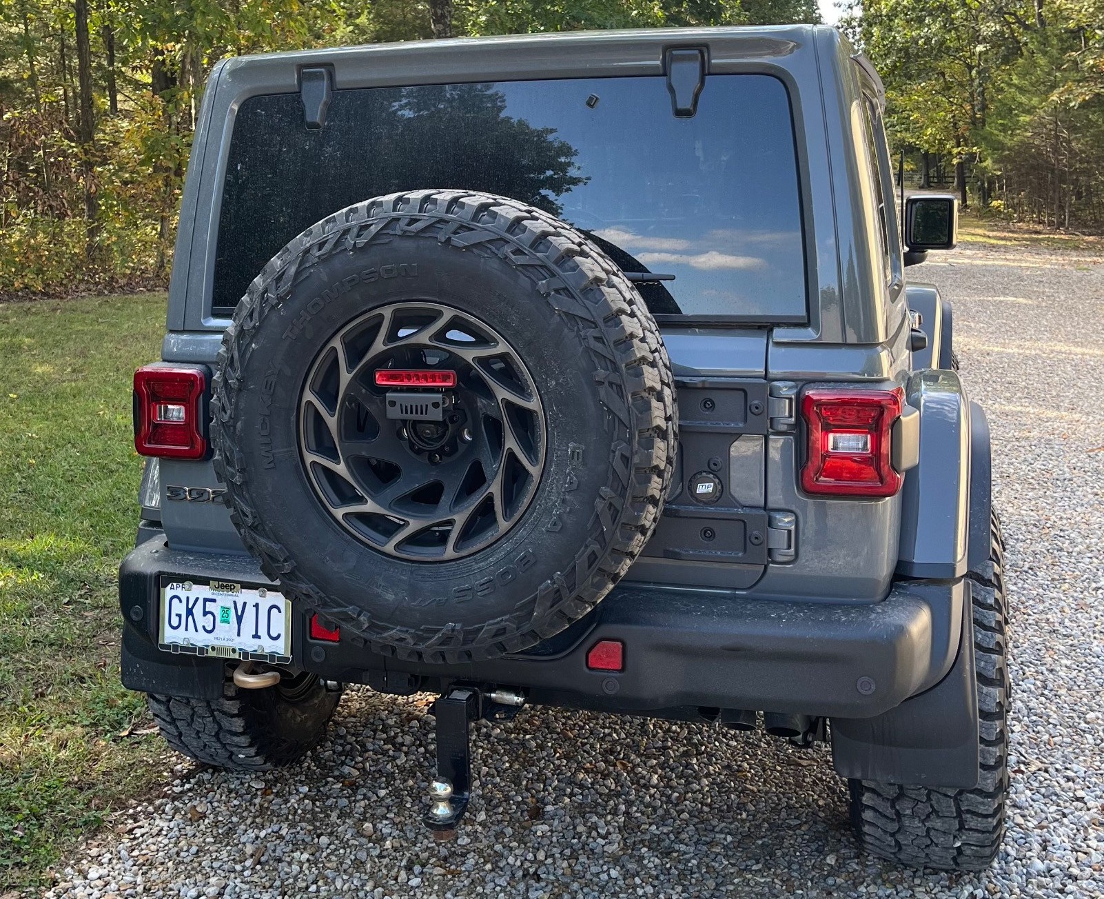 rear view of jeep wrangler parked on country road