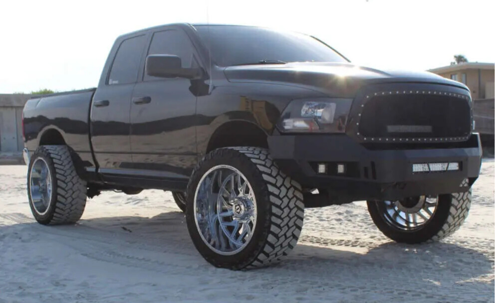 2012 Dodge Ram 1500 with Nitto Trail Grappler tires and Maxtrac Suspension Lift