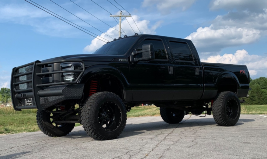 2012 Ford F-250 with Moto Metal MO970 wheels and Radar Renegade MT tires