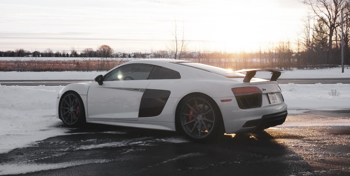 white audi in parking lot