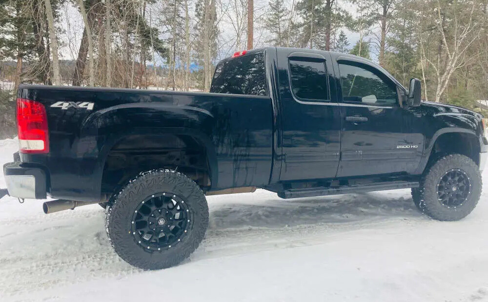 2011 GMC Sierra 2500 with Mayhem Warrior wheels and Falken Wildpeak RT01 tires