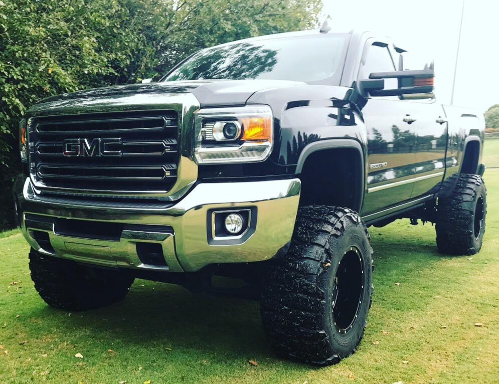 2016 GMC Sierra 2500 with Moto Metal MO962 wheels and Nitto Mud Grappler tires
