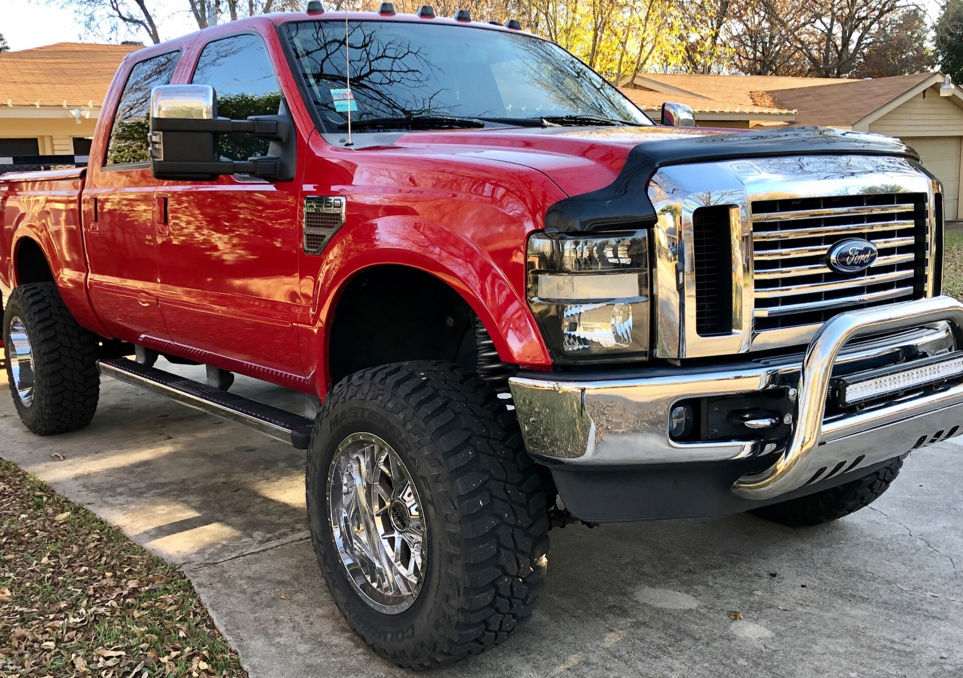 2010 Ford F-250 with Moto Metal MO986 wheels and Rough Country Suspension Lift