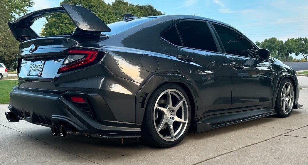 lowered subaru in driveway