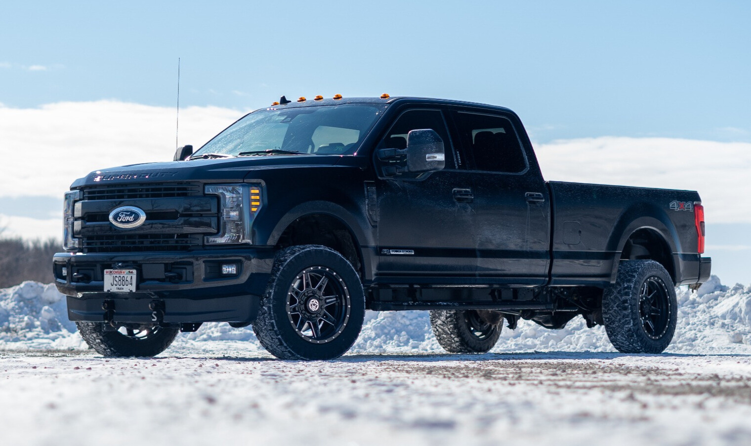 2020 Ford F-350 Super Duty with Anthem Off-Road Rogue wheels and OEM Stock