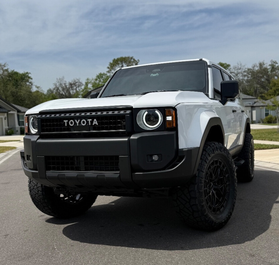 2025 Toyota Land Cruiser 1958 with Nitto Ridge Grappler tires and Rough Country Suspension Lift