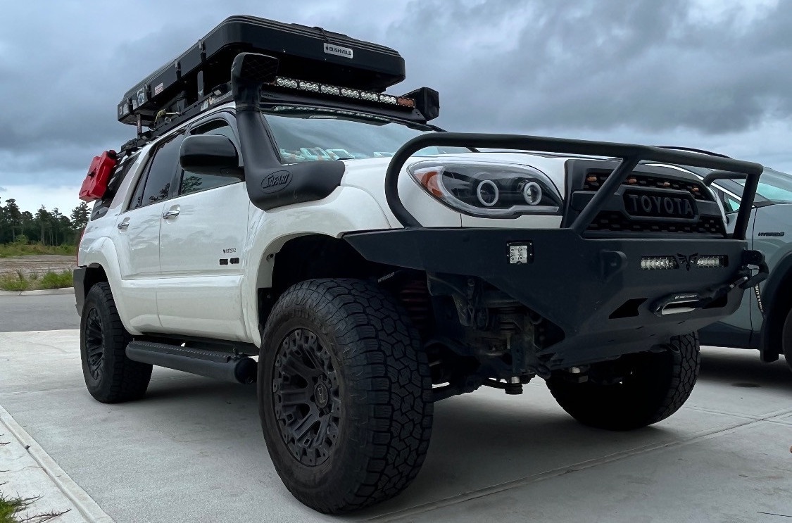 front view of white nissan xterra on driveway