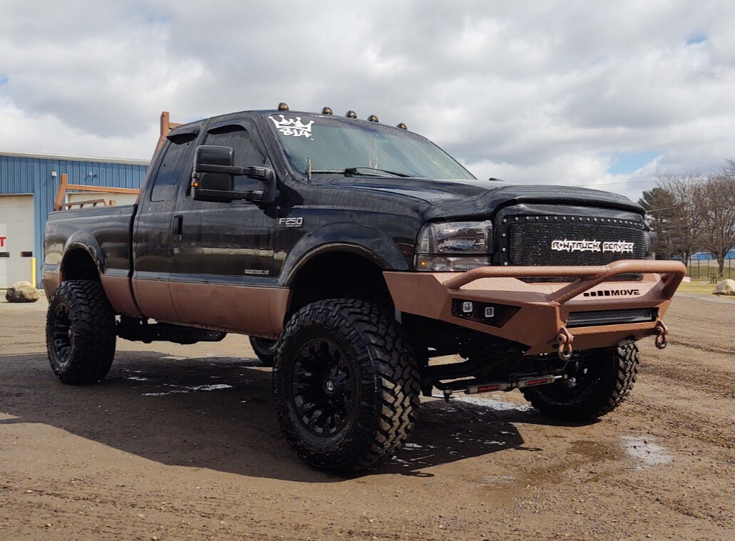 2002 Ford F-250 Super Duty with Fuel Vapor wheels and Nitto Trail Grappler tires