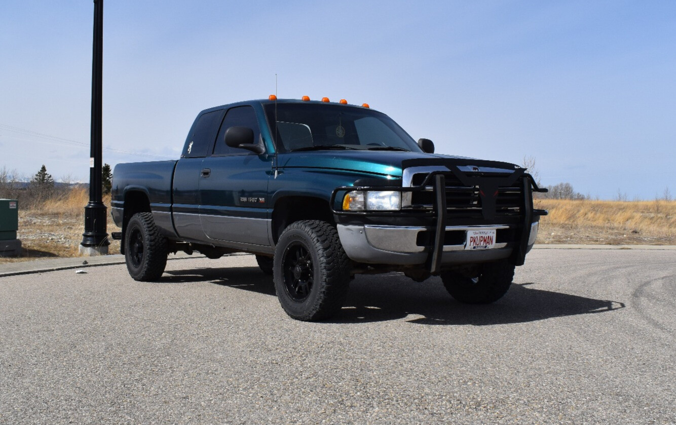 1995 Dodge Ram 1500 with Alloy Iron 179 wheels and BFGoodrich Mud Terrain T/A KM tires