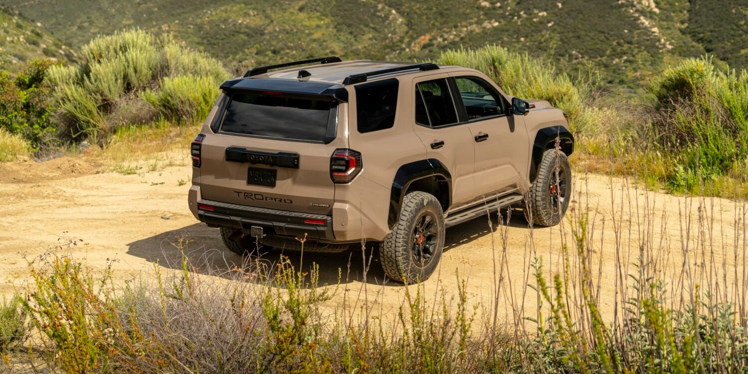 Rear shot of tan 2025 toyota 4runner trd on trail