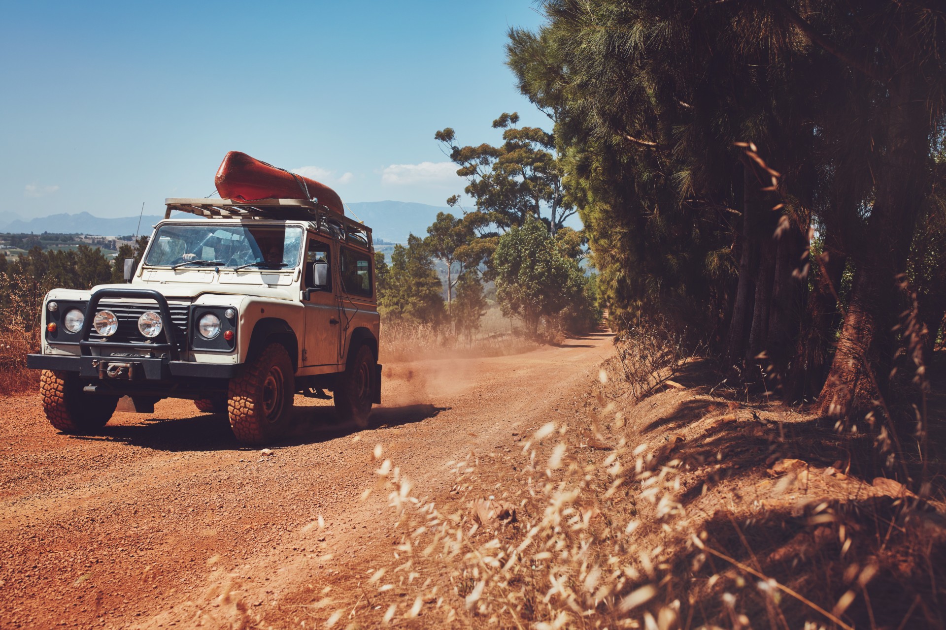 off-roading with canoe on desert trail