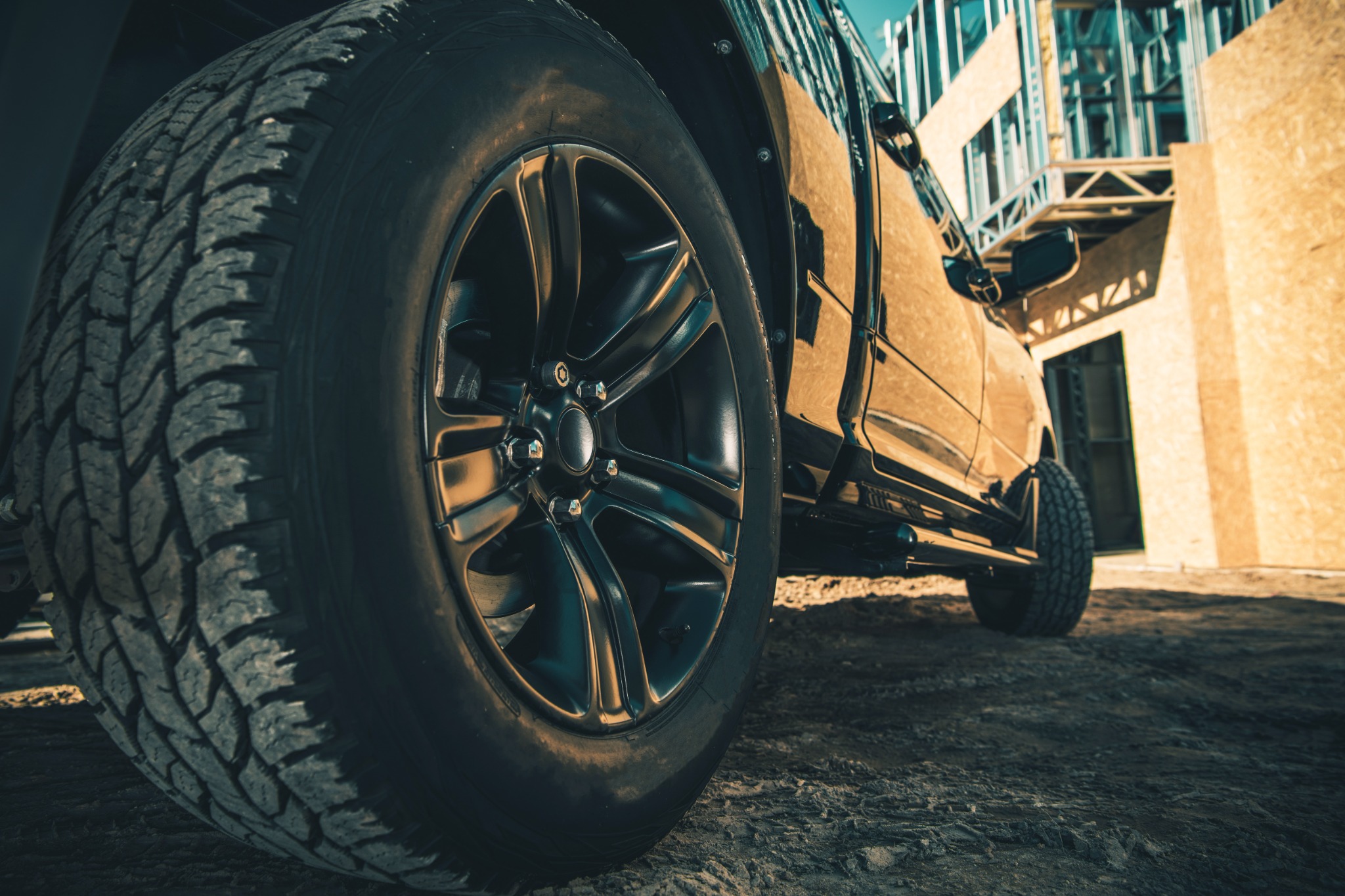 Isolated photo of truck tire on truck at job site