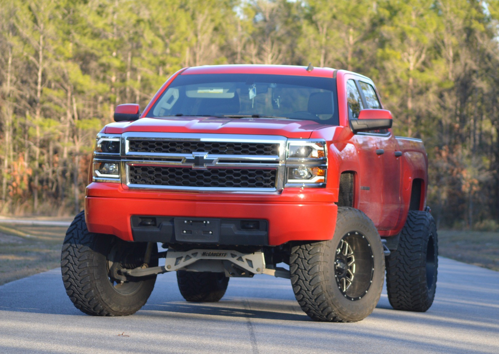 2014 Chevy Silverado 1500 with XD XD820 wheels and Toyo Open Country MT tires