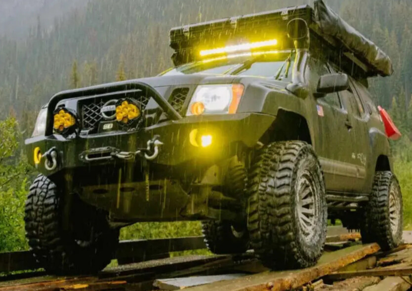 2011 Nissan XTerra with Black Rhino Raid wheels and Mickey Thompson Baja Boss MT tires