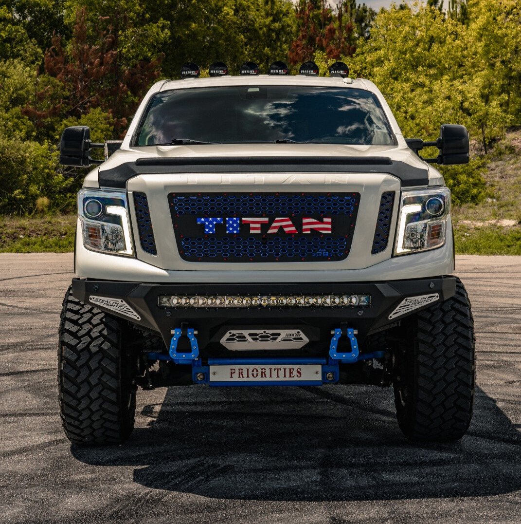 2018 Nissan Titan XD with Nitto Mud Grappler tires and Gear Off-Road 761C wheels