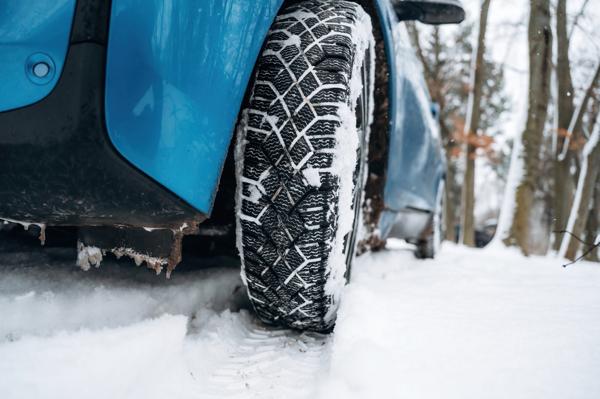 Winter tires on blue car