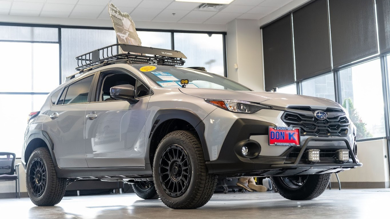 white subaru crosstrek in dealership
