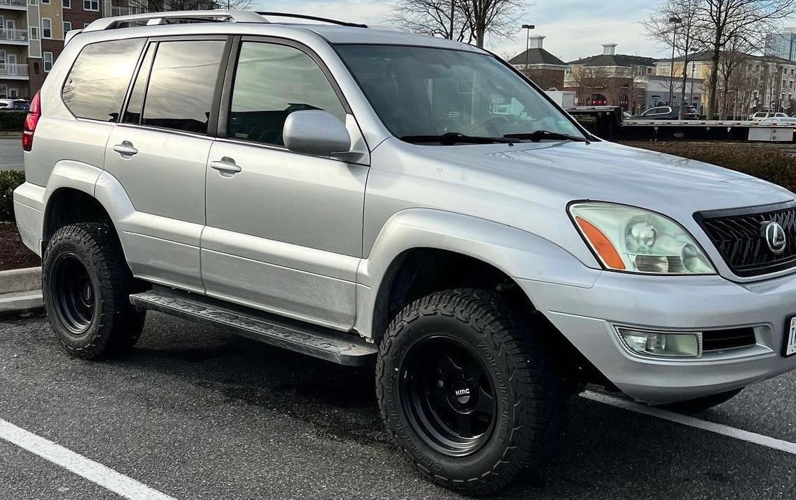 silver lexus gx470 in parking lot