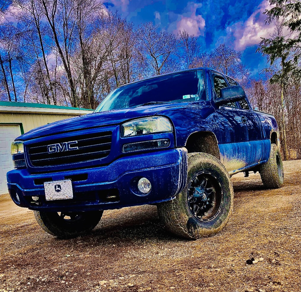 2004 GMC Sierra 1500 with Fuel Hostage wheels and Rough Country Leveling Kit